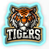 a tiger head with the word tigers on it