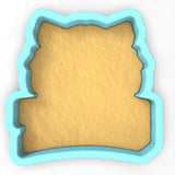 a cookie cutter shaped like a piece of bread