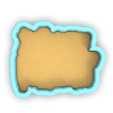 a paper cut out of the shape of a sign