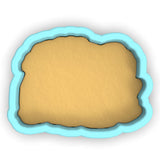 a cookie cutter with a cookie in the shape of a cloud