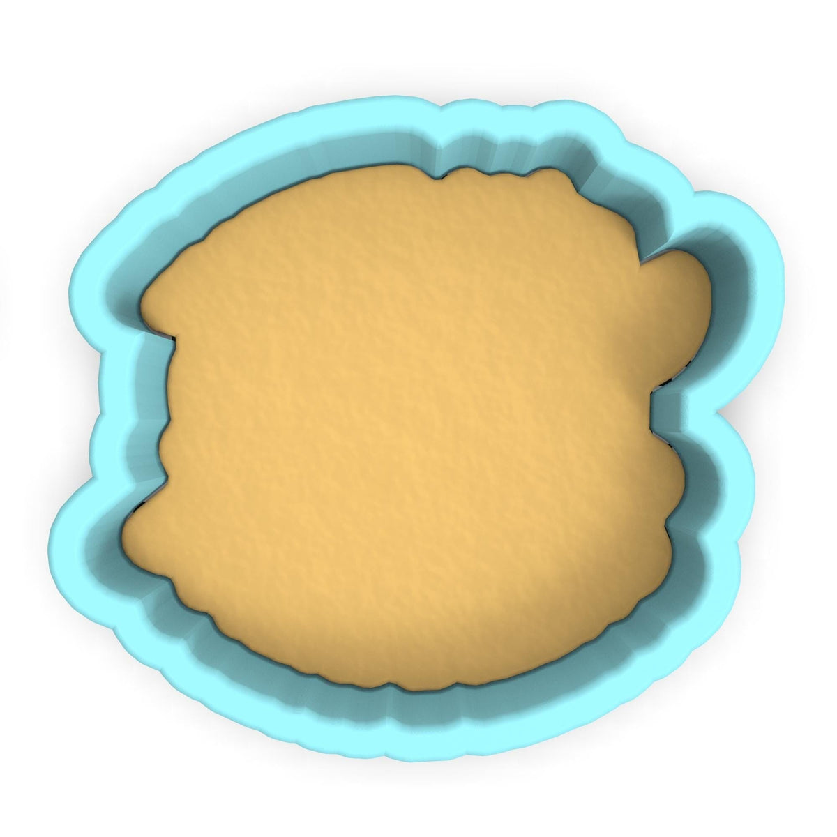 a cookie cutter with a cookie in the shape of a bear
