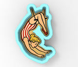 a picture of a woman swimming in the water