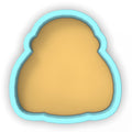 a cookie cutter with a cookie inside of it