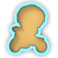a cookie cutter shaped like a teddy bear
