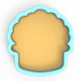 a cookie cutter with a cookie in the shape of a cookie