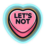 a heart shaped cookie with the words let's not on it