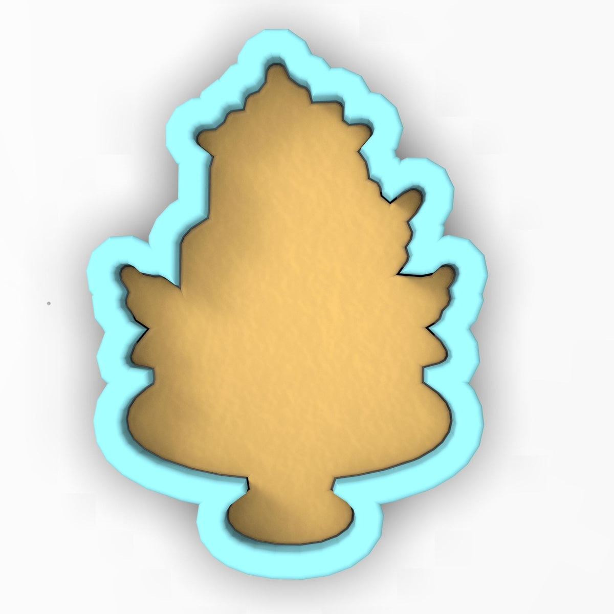 a cookie shaped like a christmas tree