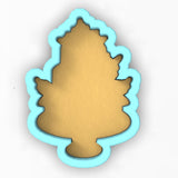 a cookie shaped like a christmas tree