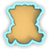 a cookie shaped like the shape of a bear