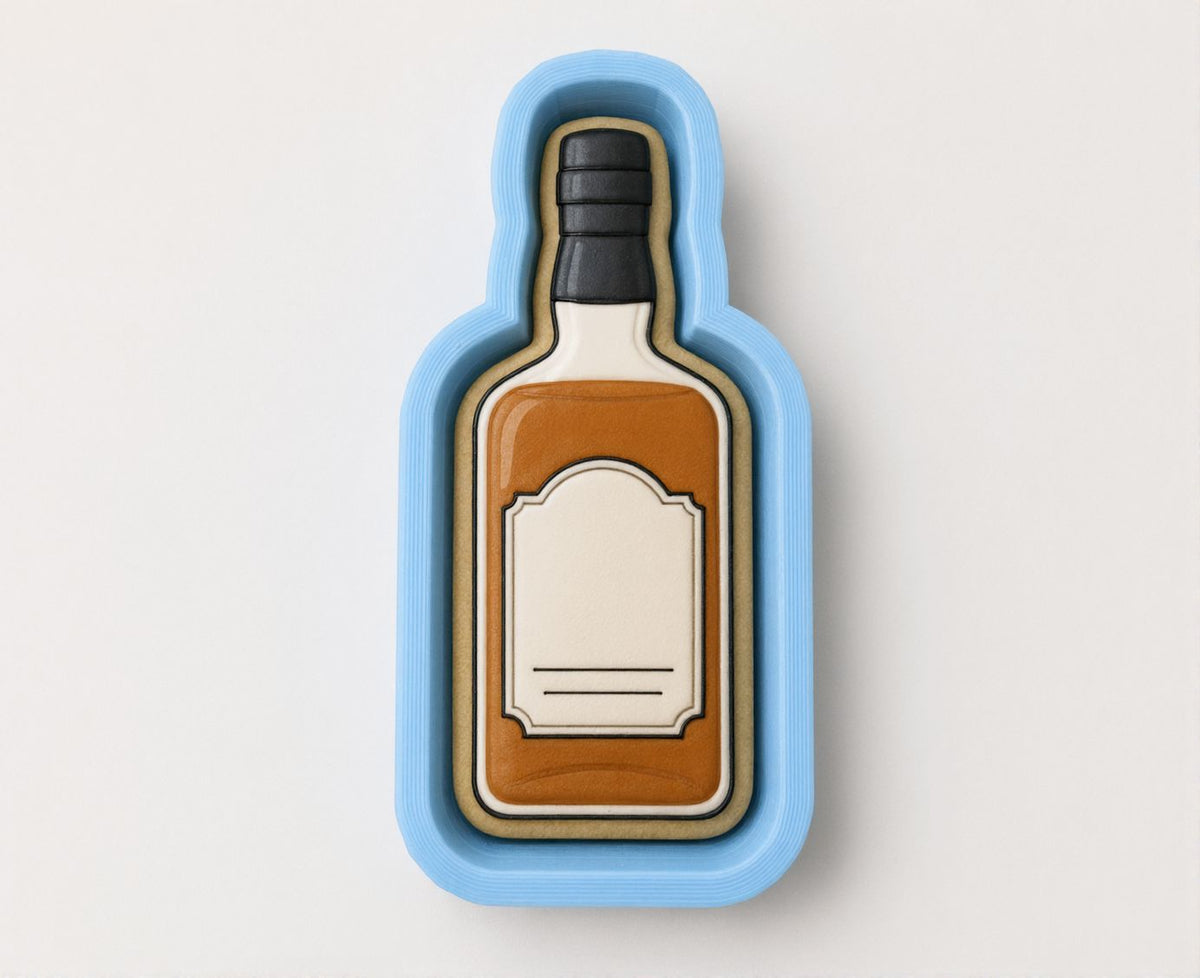 A cookie cutter shaped like a bottle of whiskey.