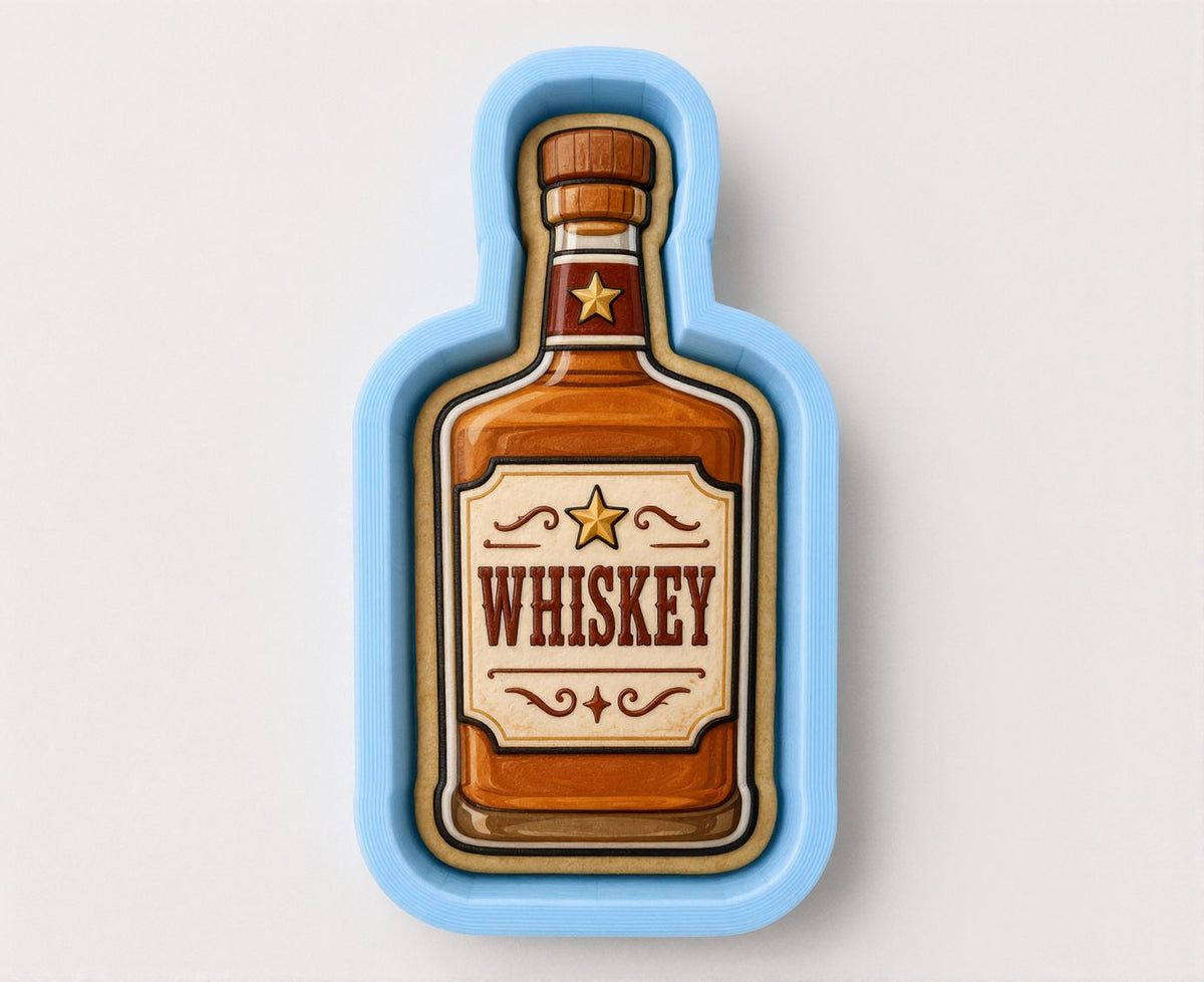 A cookie cutter shaped like a bottle of whiskey.