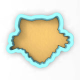 a cookie cutter shaped like the shape of a map