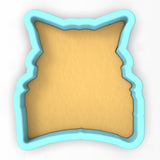 a cookie shaped like a pillow on a white background