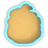 a cookie cutter with a cookie in the shape of a cookie