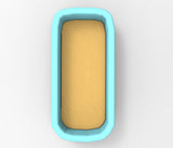 A blue rectangular container with a yellow substance inside.