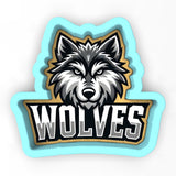 a wolf head with the word wolves on it