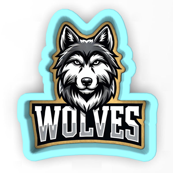 a wolf head with the word wolverines on it