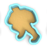a cookie cutter with a cookie in the shape of a bear