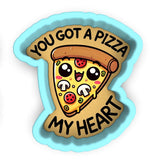 a couple of stickers that say you got a pizza my heart