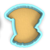 a cookie cutter with a cookie in the shape of a cookie