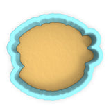 a cookie tin with a cookie crust in it