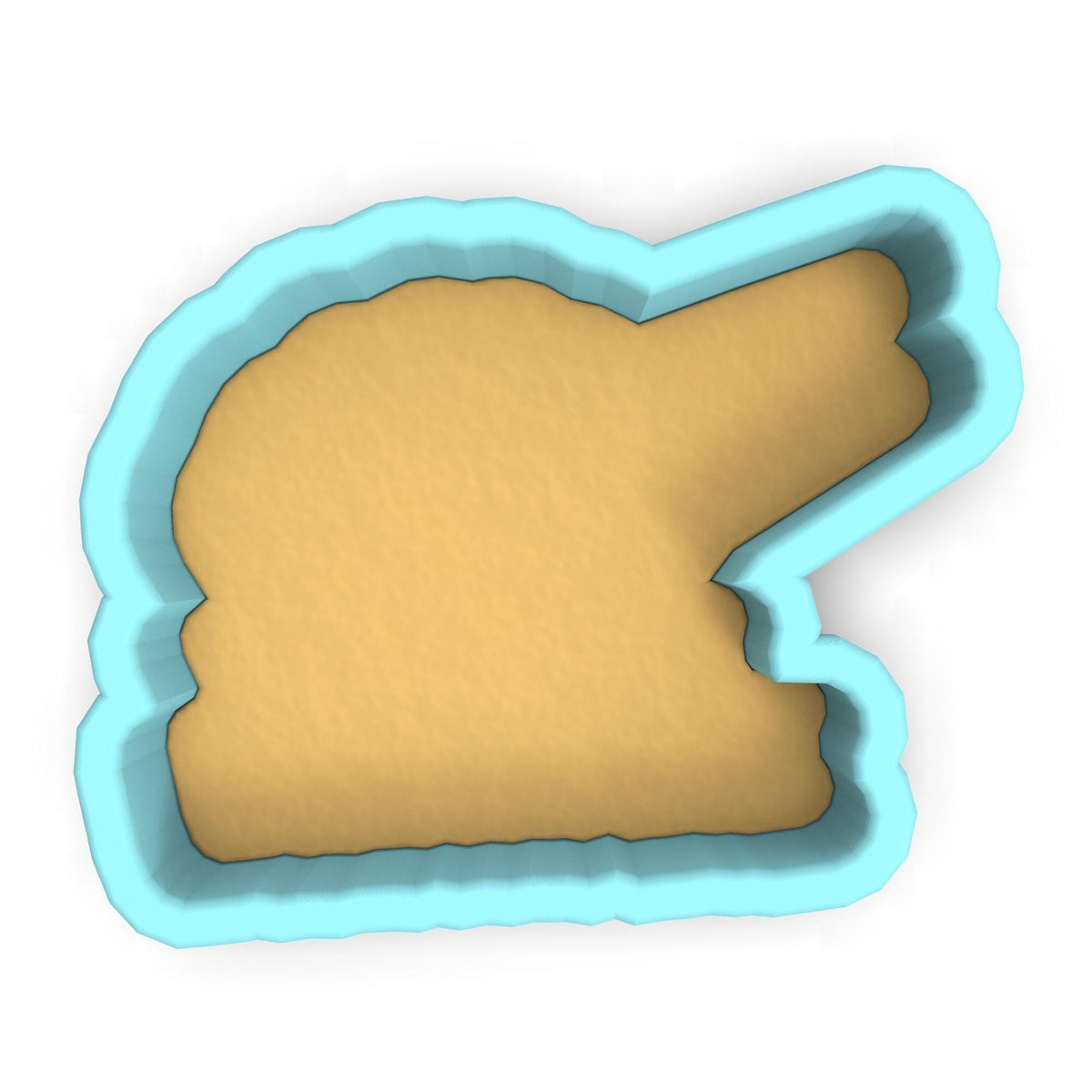 a cookie cutter with a piece of bread in it