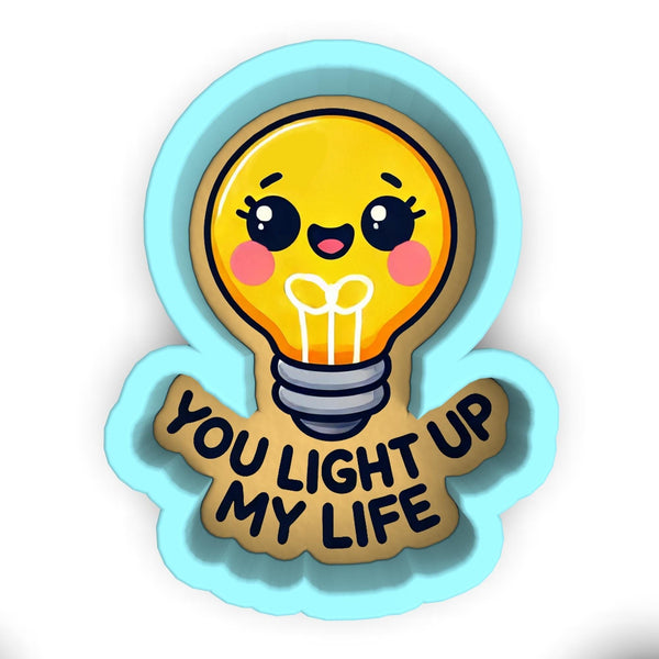 a yellow light bulb with the words you light up my life