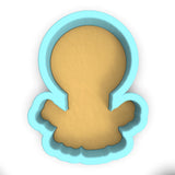 a cookie cutter shaped like a teddy bear