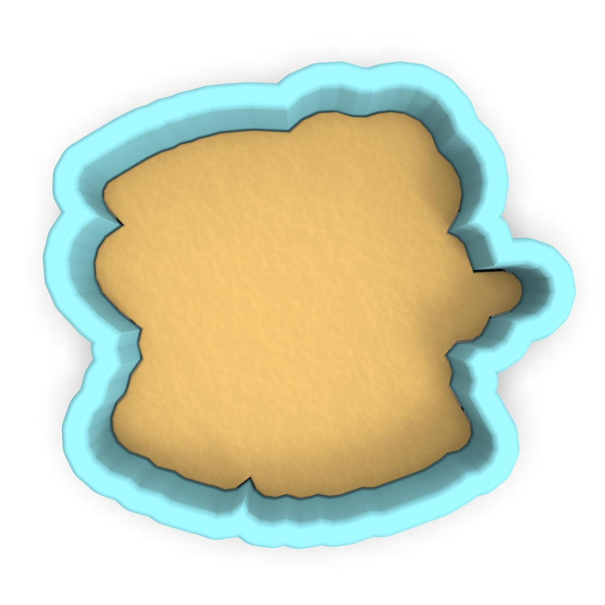 a cookie cutter with a cookie in the shape of a face