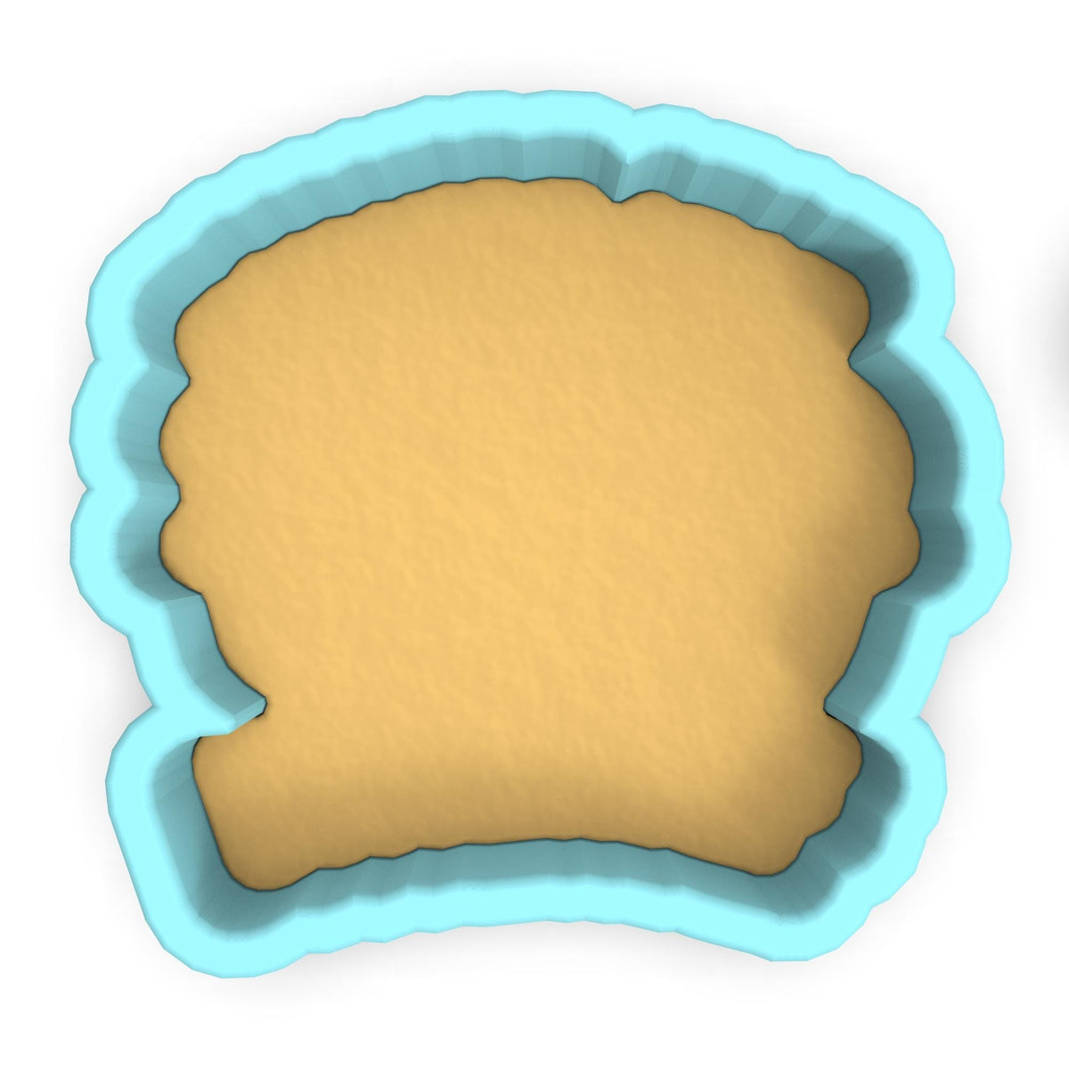 a cookie cutter with a cookie in the shape of a face